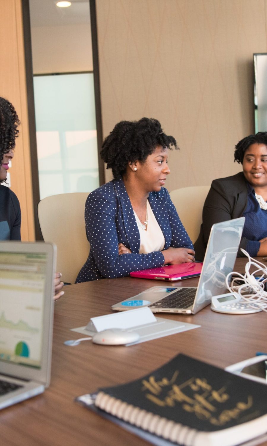 women at conference table